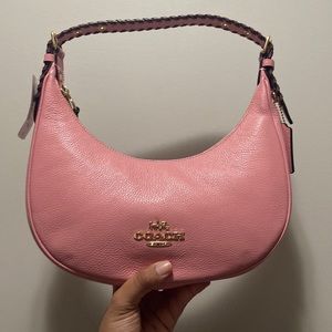 Pink Coach bag. New with tag and never has been used.